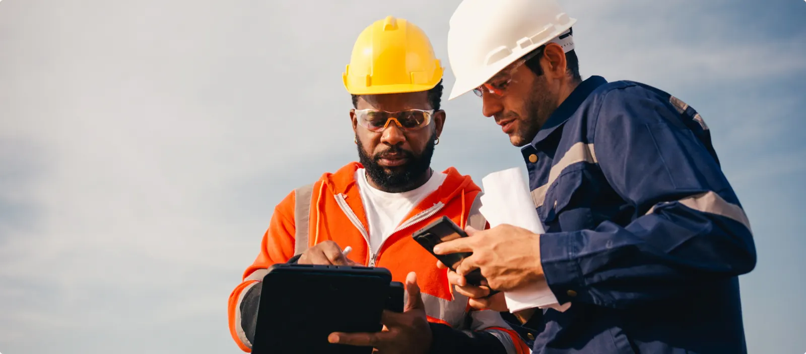 Engineers reviewing permit documents